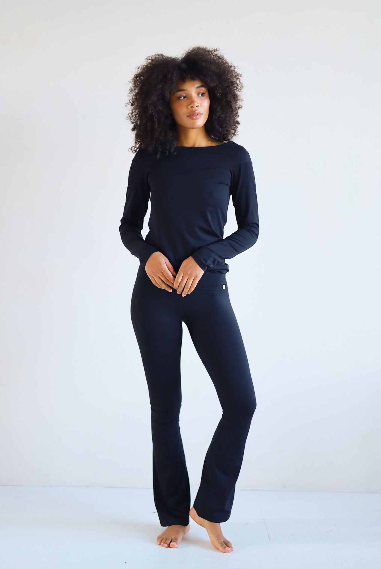 Black off shoulder top from house of gravity