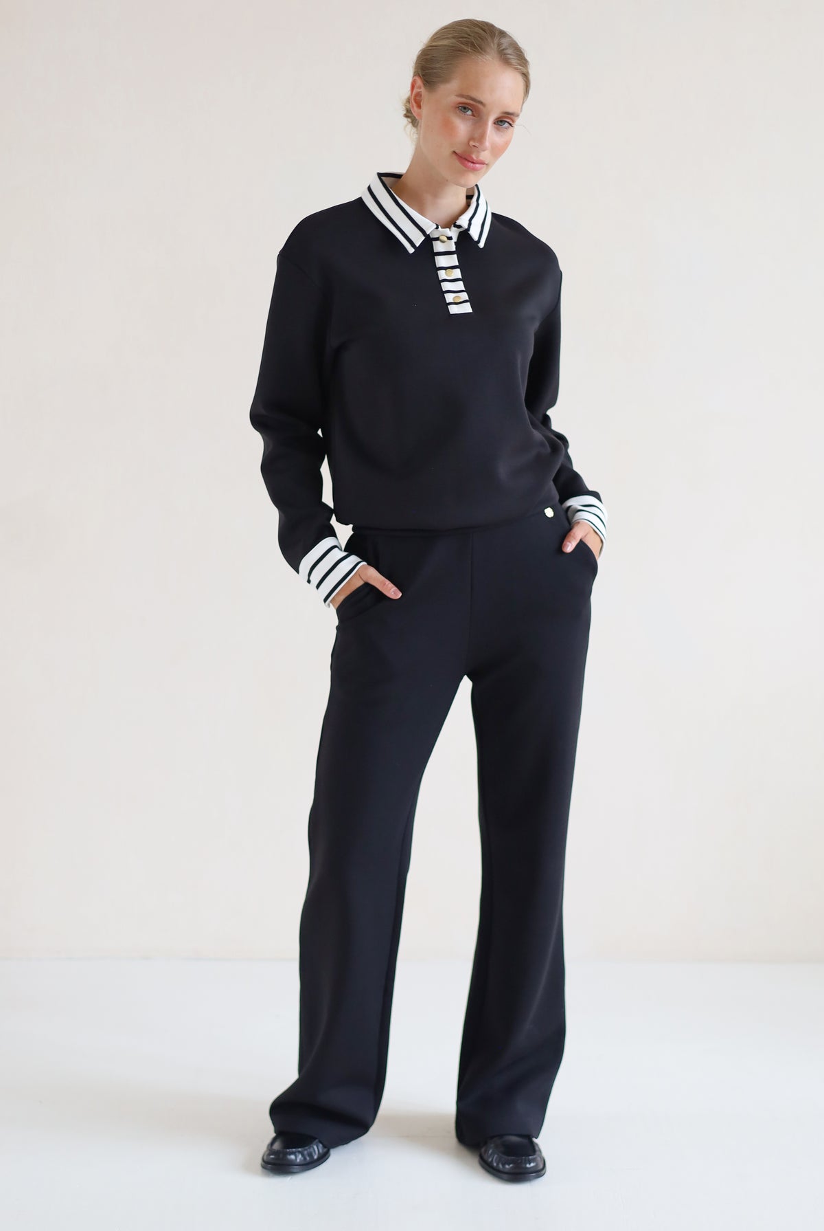 House of Gravity Button Polo Sweater in Black paired with the Wide Leg Trouser in Black