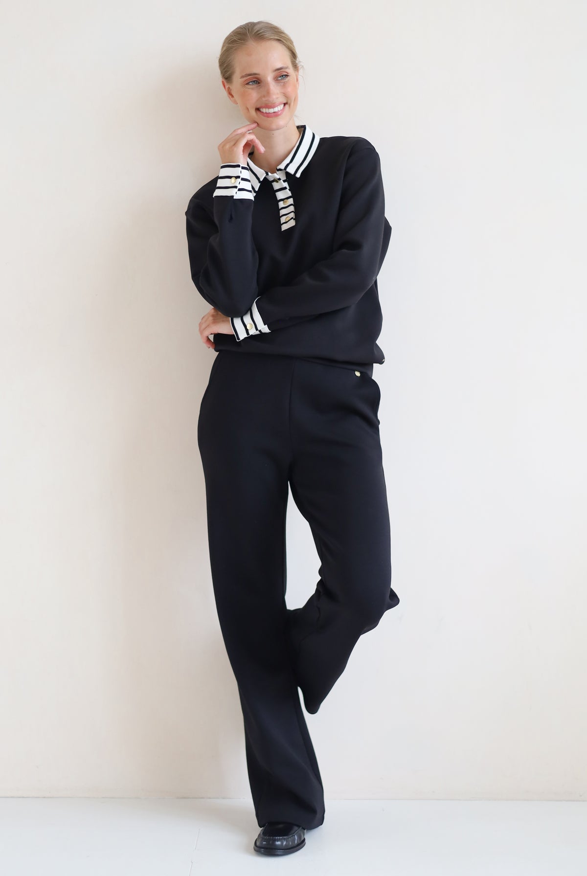 House of Gravity Button Polo Sweater in Black paired with the Wide Leg Trouser in Black