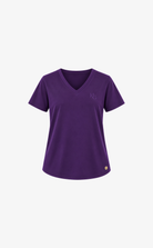 A women's short-sleeve V-neck t-shirt in deep purple, featuring a small tonal embroidered logo on the left chest and a small gold button detail near the bottom hem, displayed on a clean white background.