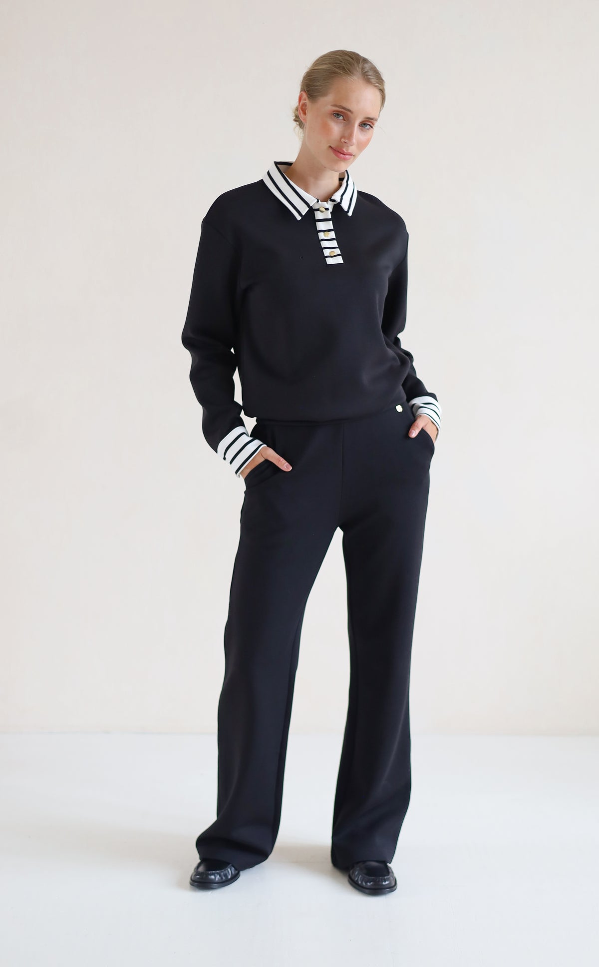 House of Gravity Button Polo Sweater in Black paired with the Wide Leg Trouser in Black
